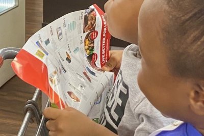 Pointing out print supermarket shot